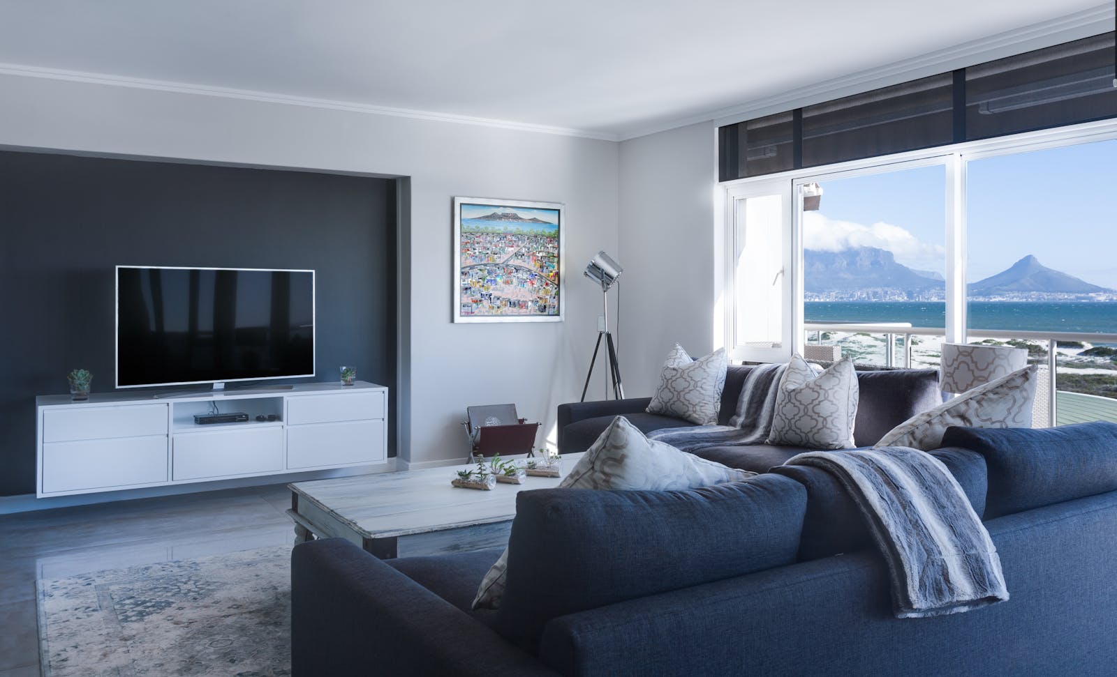 Living room with broad windows, shown as design inspiration